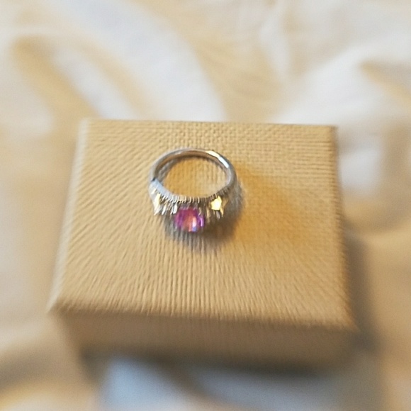 Natural pink sapphire engagement ring, with side diamonds  Pink Sapphire and Diamond Ring
